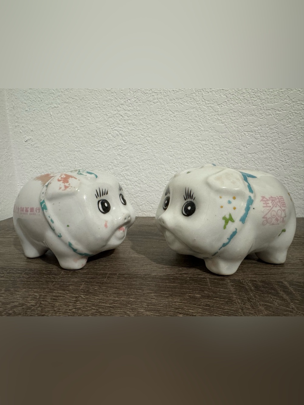 Pair of Vintage White Ceramic Pig Banks with Colorful Paint